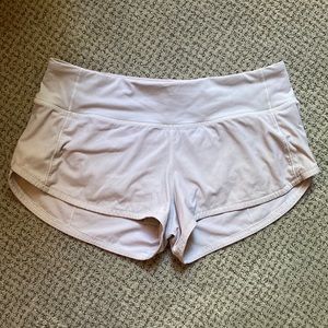 Size 4 white Speed Up Lululemon shorts